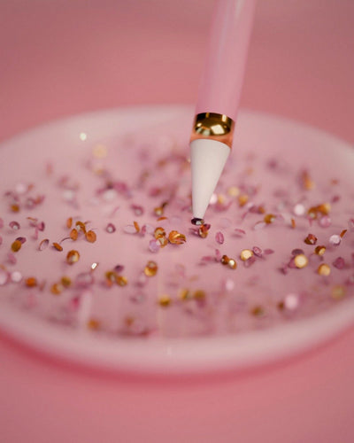 Picking a rhinestone with the pen